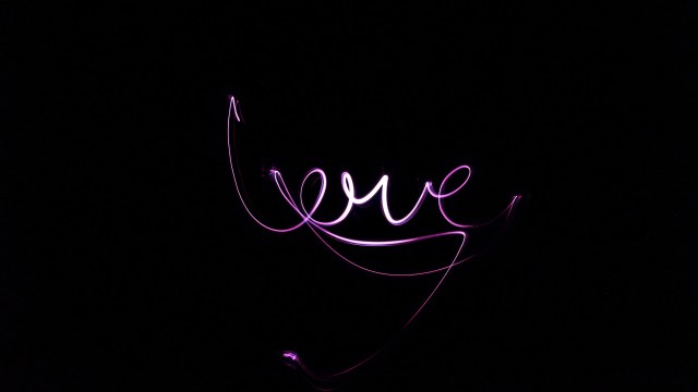 Love text Black background