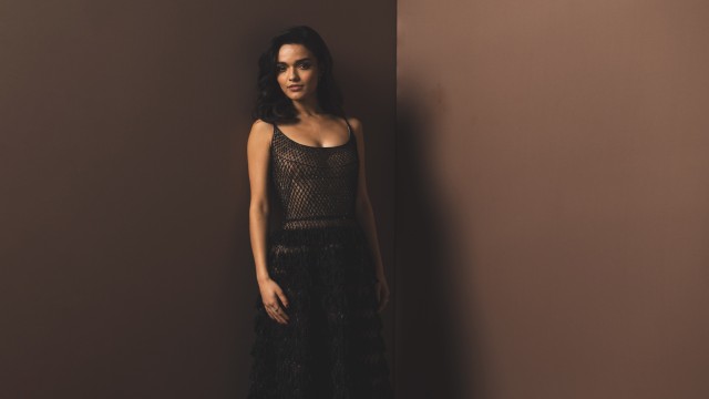 Rachel Zegler Brown background