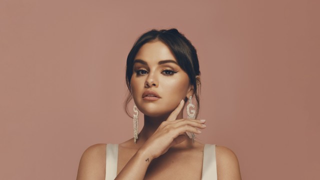 Selena Gomez Peach background