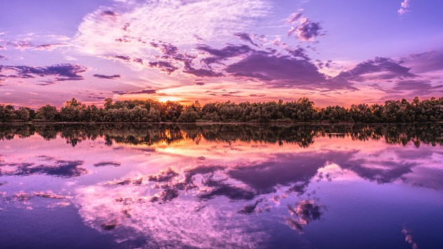 Purple sunset over lakes aesthetic