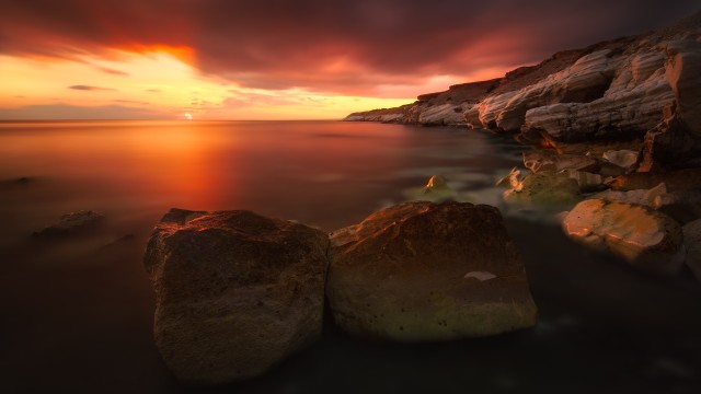 Rocky shoreline Sunset