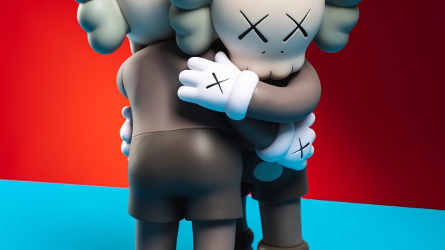 Kaws Companion Kaws hugging